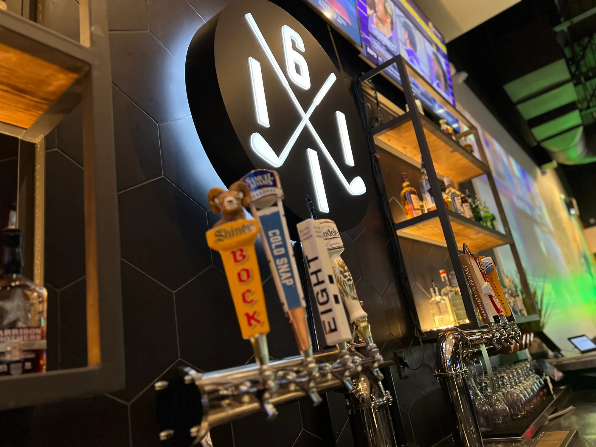 Drop hero photo — clubhouse sign or founders