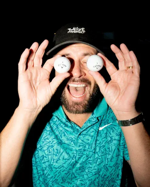 Guy using golf balls as eyes