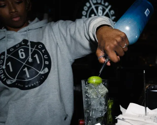 Bartender making drinks